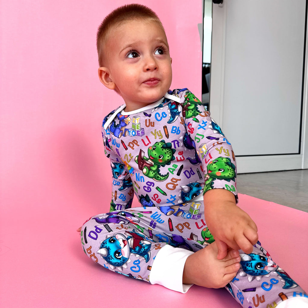 Set bebeluși „Dino inteligent” (țesătură Gentle Touch)