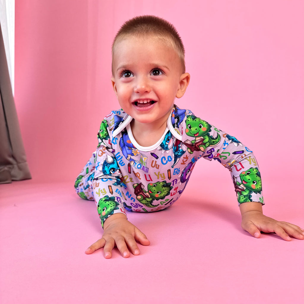 Set bebeluși „Dino inteligent” (țesătură Gentle Touch)